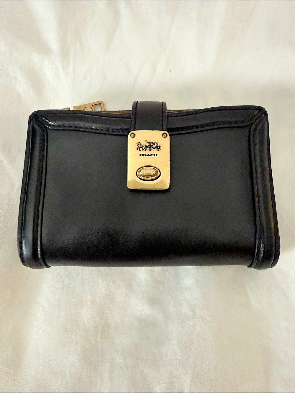 Coach Black & Brown Hutton wallet.